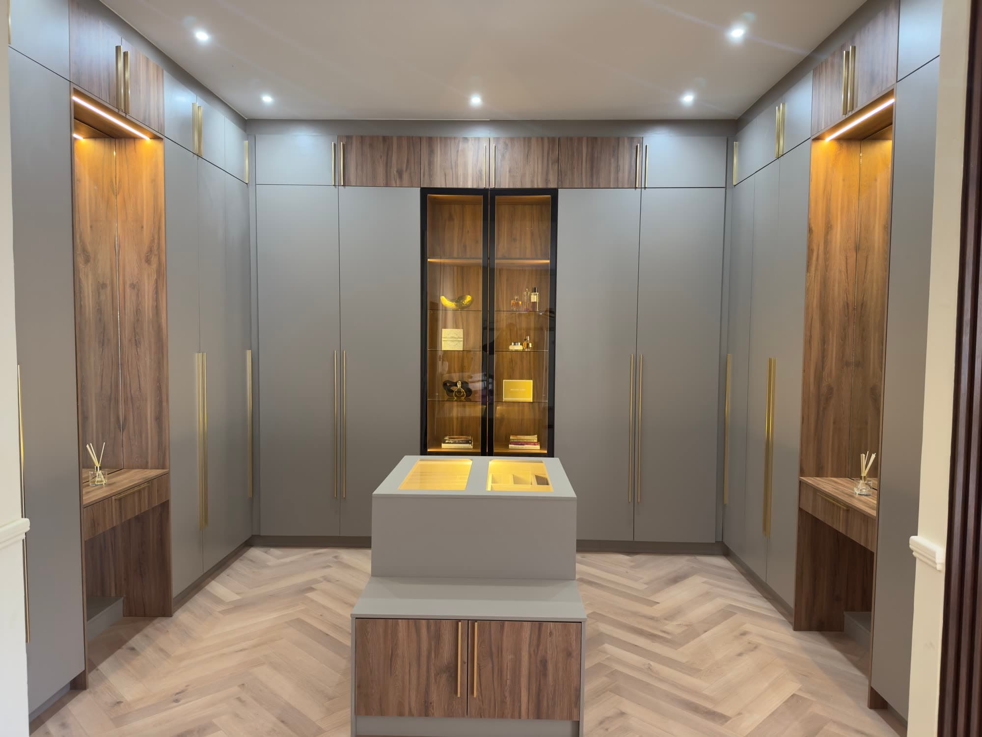Walk-in closet, gold-trim wardrobes
