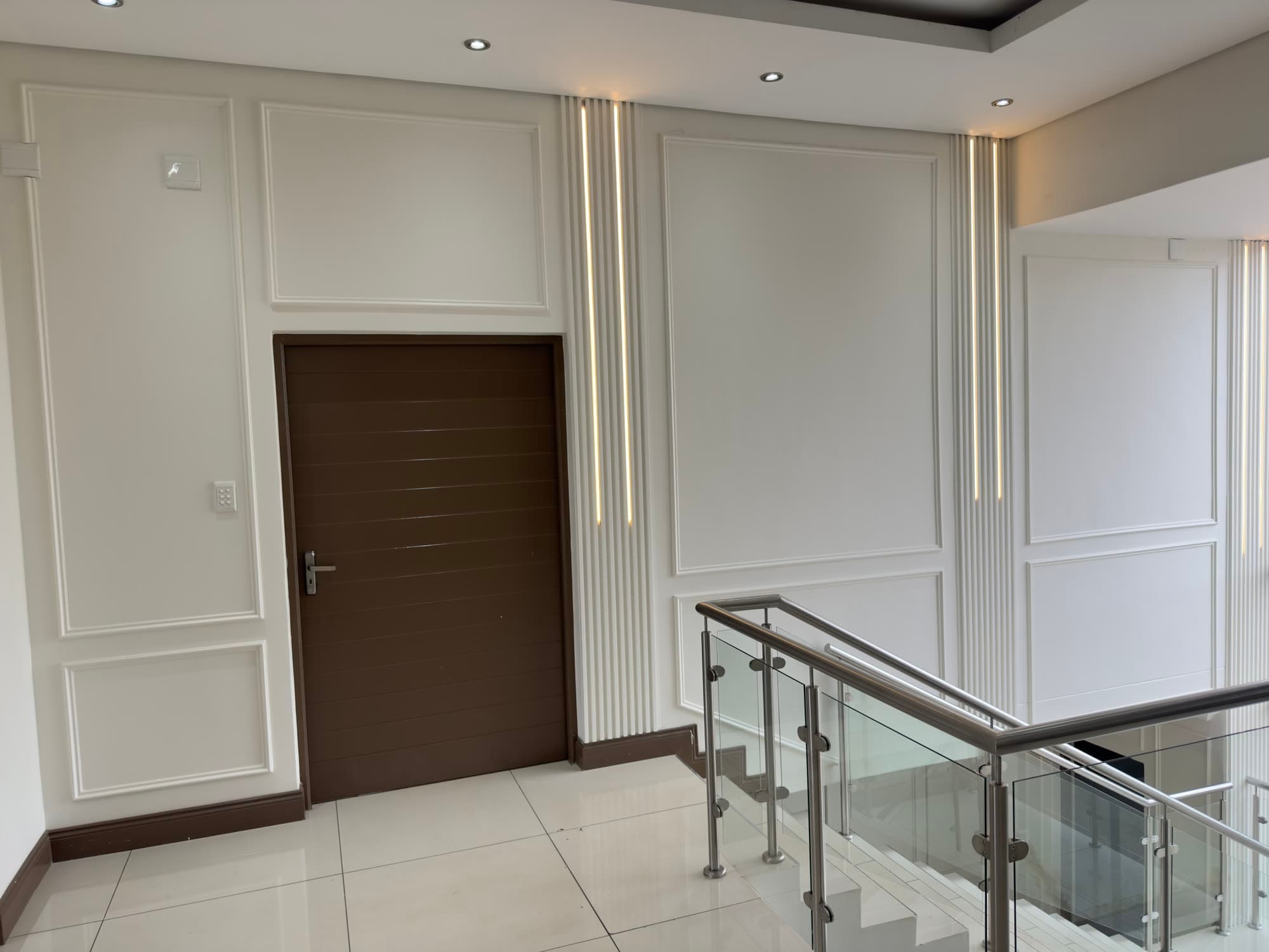 Hallway panelling, door surround