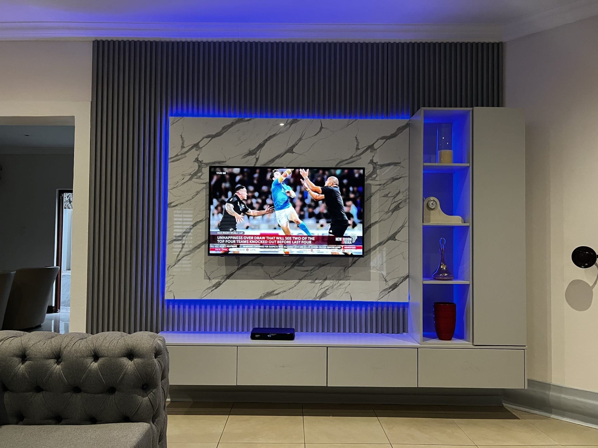 TV media wall, backlit marble panel